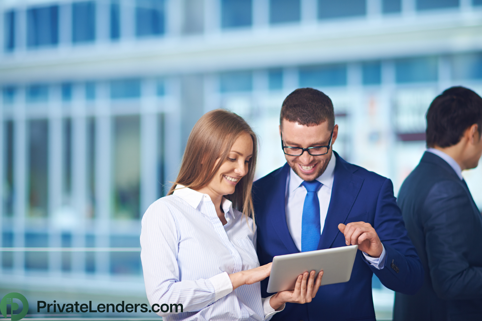 A man and woman reviewing their investment strategies on a tablet.